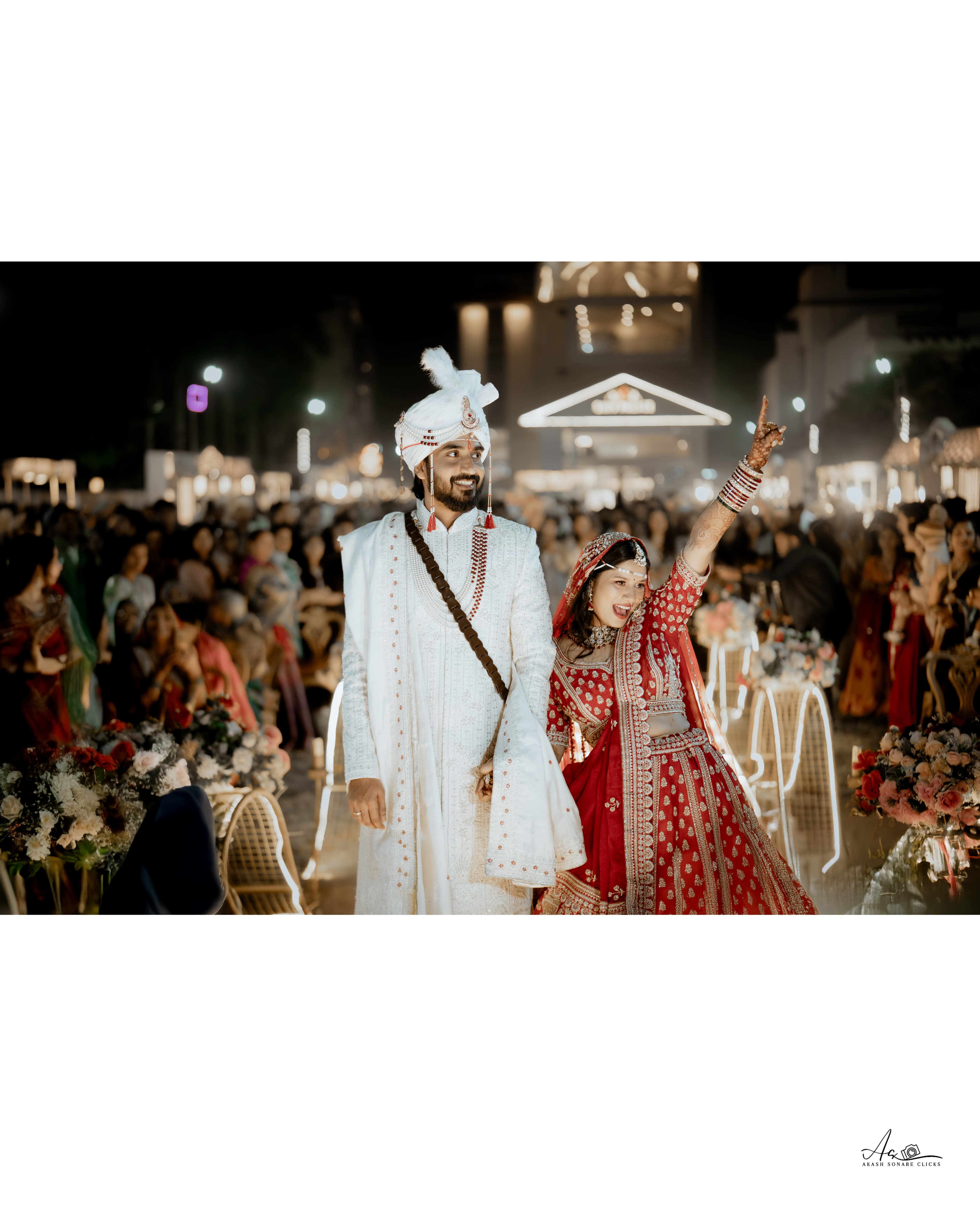 Candlelit reception table with floral centerpieces